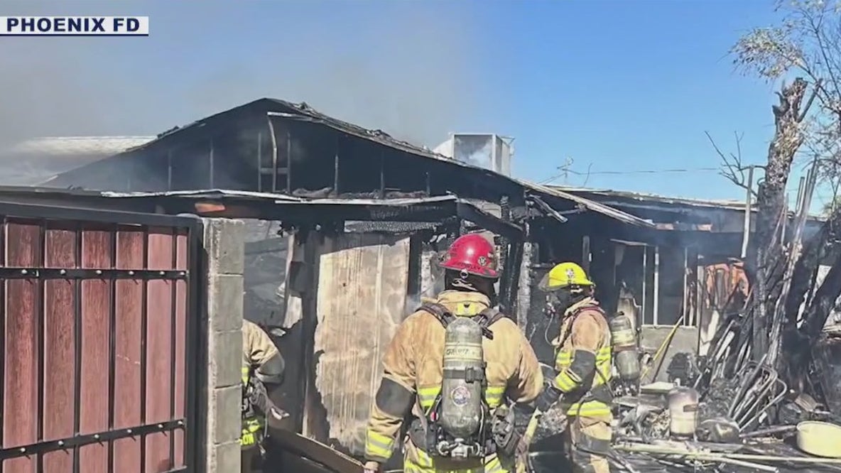 Phoenix Fire Department rescues dog from burning home